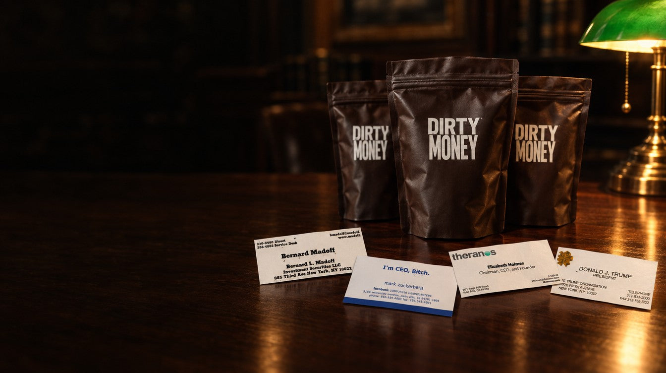 Three DirtyMoney packs on a desk with founder business cards in front of them
